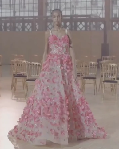 Rose petals and peony bouquets forming the feminine curves by @eliesaabworld haute couture SS22 collection.