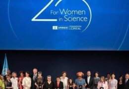 Five female scientists from different countries,