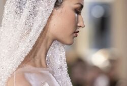 Georges Hobeika’s latest bridal Couture SS24 dress is a masterpiece that seamlessly blends sensuality with a modest aesthetic, resulting in a truly captivating and elegant dress. This exquisite creation showcases the designer’s impeccable craftsmanship and attention to detail.