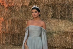 This week, Dubai-based influencer Ola Farahat has been on a high-fashion spree in Italy, culminating in her stunning appearance at the Dolce & Gabbana Alta Moda show. The Palestinian fashion icon turned heads on Tuesday in a regal, off-the-shoulder grey chiffon dress, adorned with a glitzy tiara and a silver clutch. Simply breathtaking!