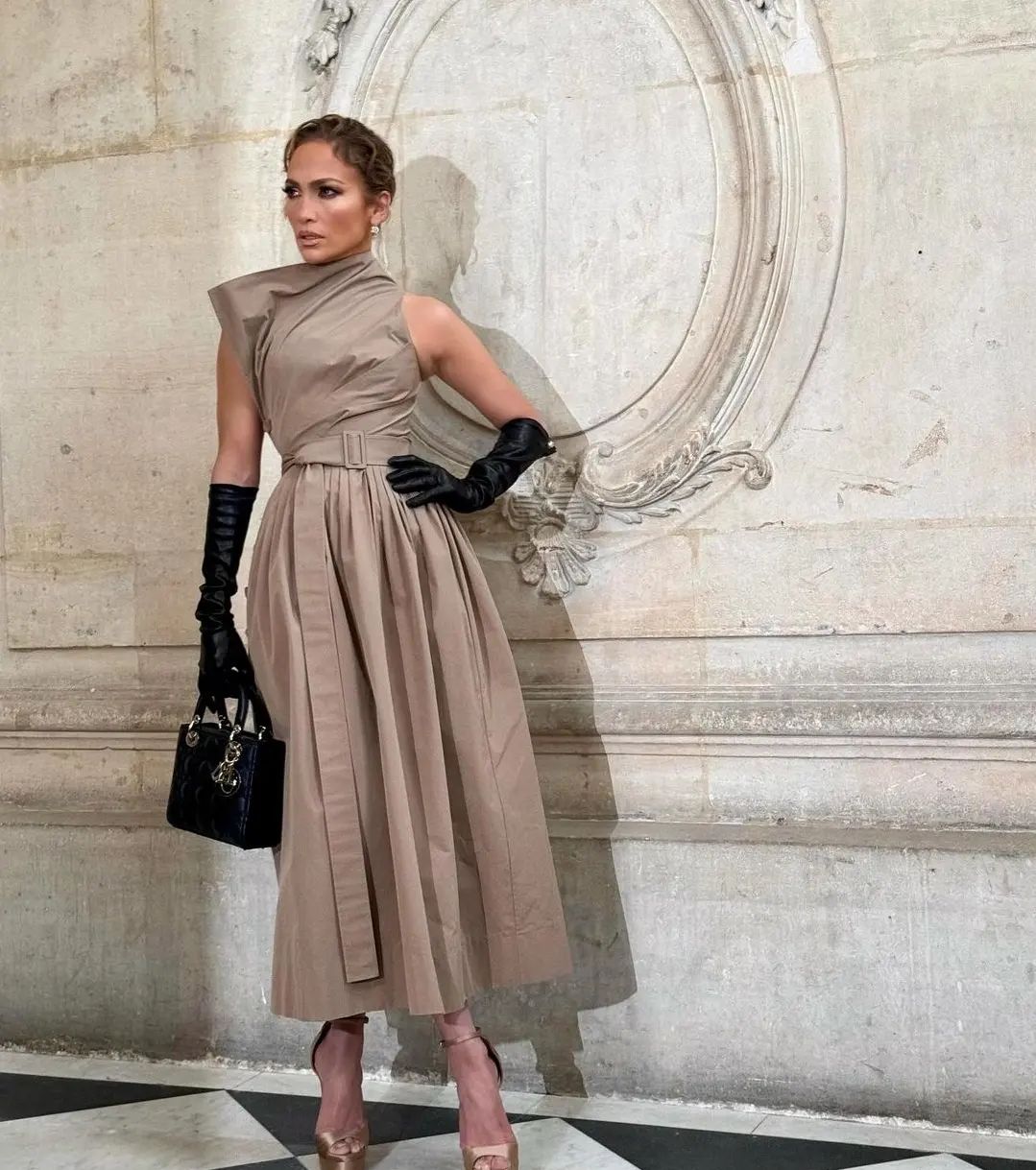 JLo dazzling at Dior for #PFW, bringing star power and style to Paris!