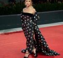Brazilian model and influencer Maria Braz captivated the crowd at the Venice Film Festival, making a striking appearance at the screening of ‘The Room Next Door.’ She dazzled in a stunning creation by Lebanese designer Georges Chakra—a strapless gown that artfully combined bold polka dots with intricate sequin embellishments. Elevating the look to new heights, Braz draped a dramatic, oversized polka-dotted shawl over her arms, exuding both elegance and avant-garde flair. It was a moment of pure sartorial brilliance that left a lasting impression on the red carpet.