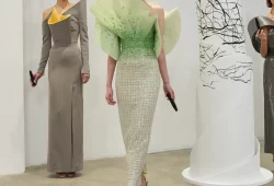 Rami Al Ali redefines couture storytelling with his SS25 collection, blending the precision of Op Art with the raw elegance of nature. This season, movement becomes part of the narrative—models intertwine with dynamic sculptures, creating a visual symphony of fluidity and structure. Organic silhouettes contrast with bold geometric patterns, reflecting a harmonious balance between artistry and innovation. A masterful performance where fashion meets architectural expression.