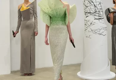 Rami Al Ali redefines couture storytelling with his SS25 collection, blending the precision of Op Art with the raw elegance of nature. This season, movement becomes part of the narrative—models intertwine with dynamic sculptures, creating a visual symphony of fluidity and structure. Organic silhouettes contrast with bold geometric patterns, reflecting a harmonious balance between artistry and innovation. A masterful performance where fashion meets architectural expression.