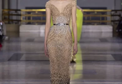 A couture masterpiece emerges, weaving the magnificence of savoir-faire. Each creation is a bold transformation, radiating grandeur from afar and captivating with figure-flattering silhouettes up close.