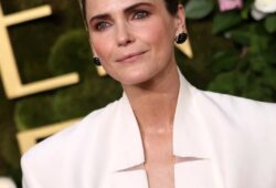 Keri Russell stunned at the 82nd Annual Golden Globe Awards, gracing the red carpet in a tailored white wool gazar dress from Stéphane Rolland’s Haute Couture FW 24-25 collection. The look was elevated by a striking waist brooch crafted from yellow blown glass and diamonds. Swipe to catch a glimpse of her behind-the-scenes glam moments leading up to the big night!