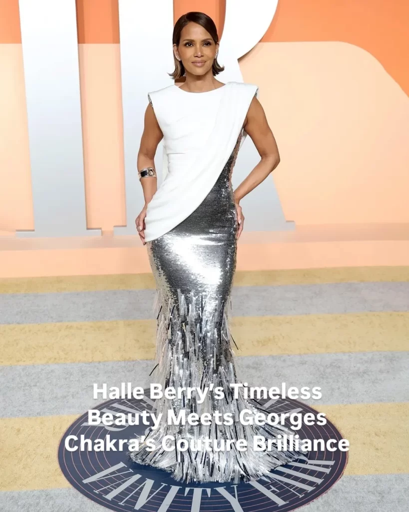 Halle Berry serving pure elegance in Georges Chakra at the #VanityFairOscarParty ,A timeless icon in a gown that’s all about glamour and grace. Who else is obsessed with this look?