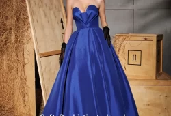 Nour Fathallah presents the 2025 Spring/Summer collection, DOLLEA, where elegance meets fantasy. Inspired by the whimsical world of dolls, this collection features pastel tones and luxurious fabrics like crepe, tulle, lace, satin, sequins, chiffon, and taffeta, creating a perfect blend of sophistication and charm.