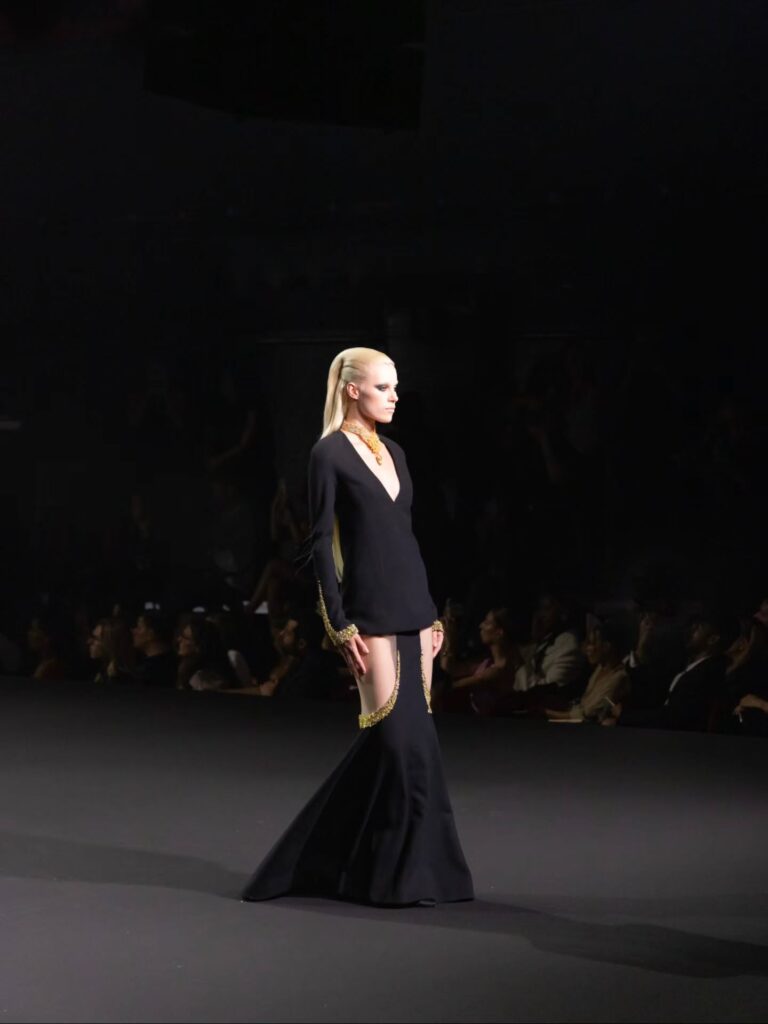 At the legendary Olympia in Paris, Stéphane Rolland once again proved that Haute Couture is more than fashion—it's emotion, architecture, and artistry woven into every silhouette. His Fall/Winter 2026–2027 collection paid a moving tribute to the iconic Dalida, retracing her journey from Cairo to Paris through a series of extraordinary sculptural creations that embodied strength, elegance, and theatrical grandeur. From sweeping capes and impeccable draping to the maison's signature architectural volumes, each silhouette reflected Rolland's unparalleled mastery of couture design.