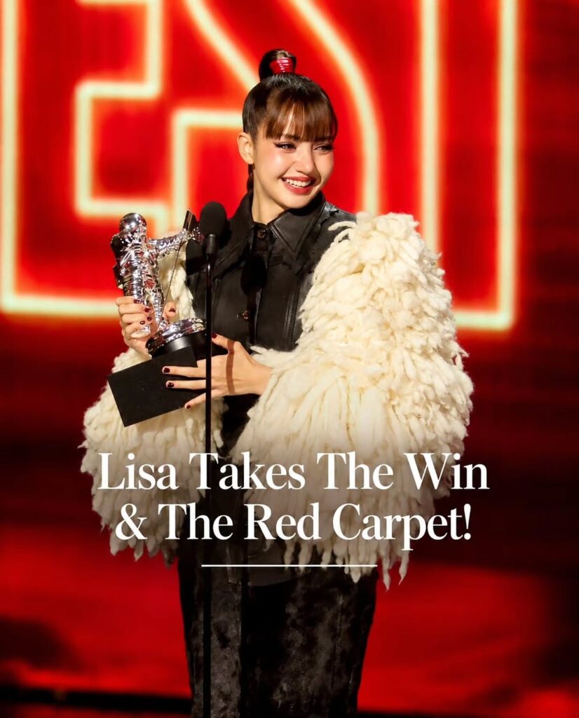 Lisa Takes The Win & The Red Carpet.
